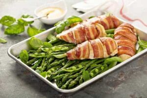 Stuffed Chicken Breasts w/Bacon-wrapped Asparagus and Goat Cheese